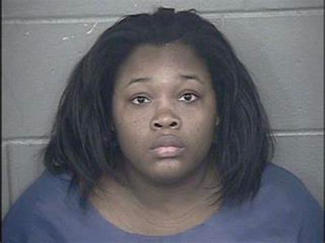 Mother charged with death of infant .